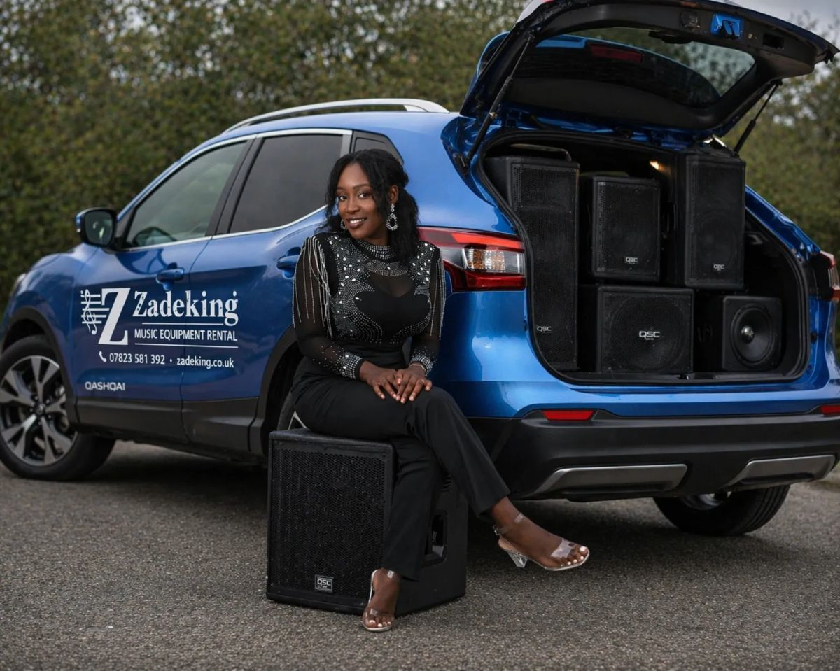 Zadeking owner Tian with QSC speakers loaded in the branded van