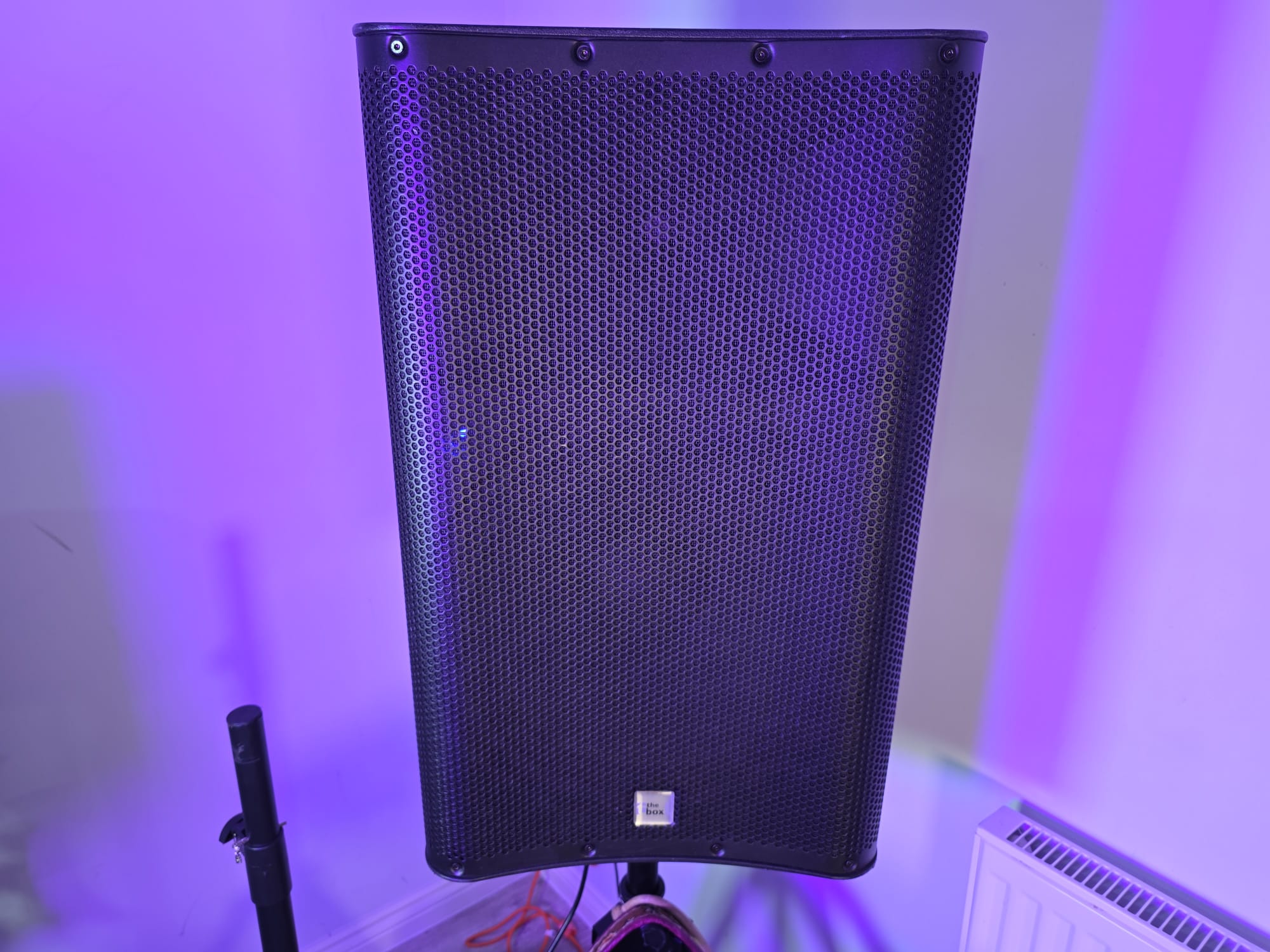 Speaker with atmospheric purple lighting