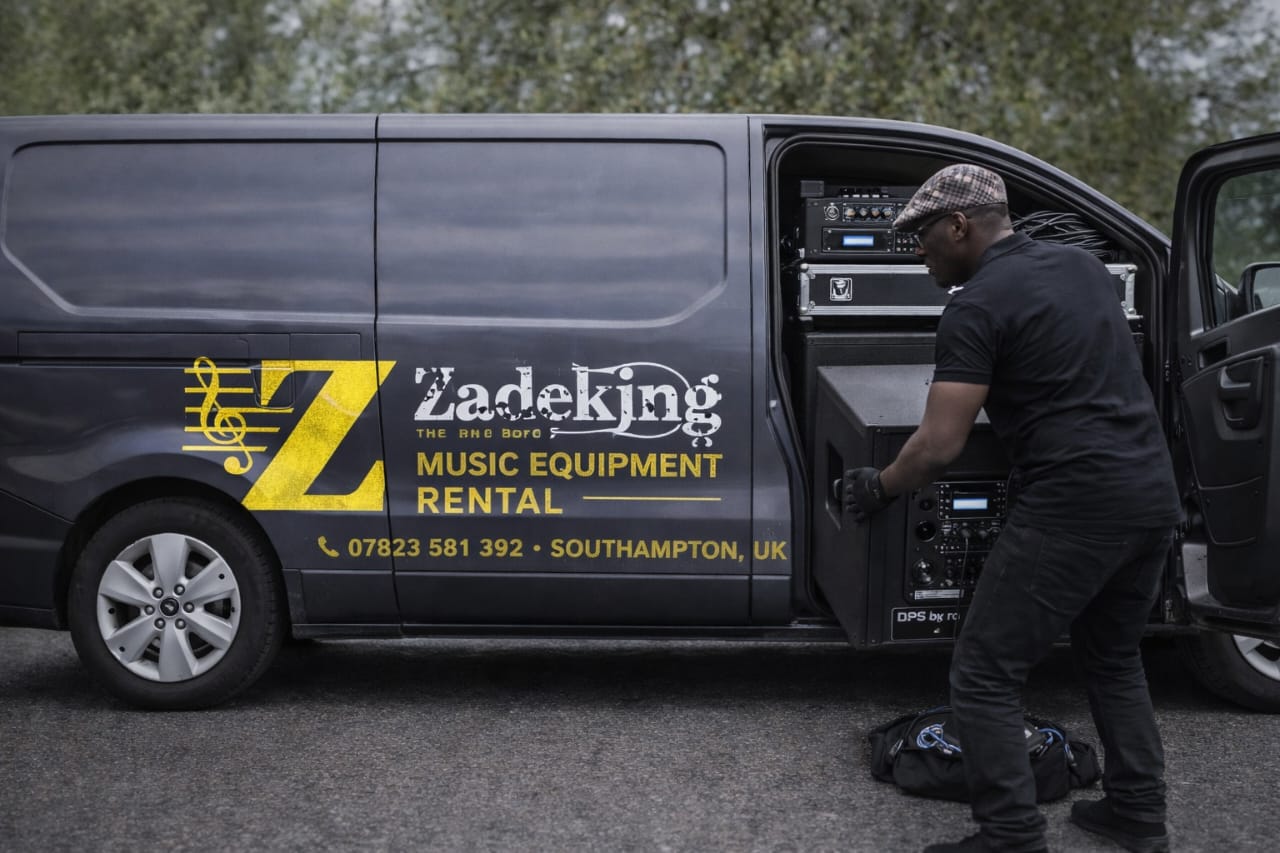 Loading professional sound equipment into the Zadeking van